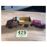 Old Hubly toy, dump truck, and a Chevrolet car