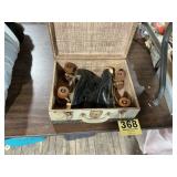Old pair of rollerskates with carry case