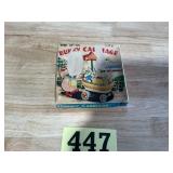 Vintage wind up toy bunny carriage in original