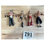 Lots of four wrestling action, figurines, John