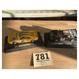 Two metal Ferrari race cars