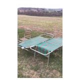Two folding cots and folding chair