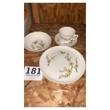 Yellow floral dining set believed to be set of 12