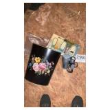 Desk mirror, blow dryer, and bathroom garbage can