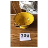 Yellow enamel colander