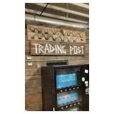 Wooden sign trading post