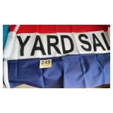 Like new yard sale flag and also a new package