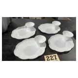 Set a four white milk, glass serving plates with