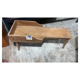 Unique, old wooden bench stand