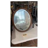 Older Oval Mirror with wood frame