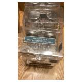 Six sets of mason jar, salt, and pepper shakers