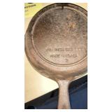Two 6 1/2 inch cast-iron skillets one made in