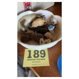 Cat figurines in a bowl