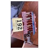 Metal horse and trolley plaque