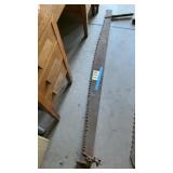 Two men cross cut saw
