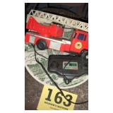 Remote control fire truck on a Milton plate
