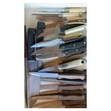 Box  full of steak knives