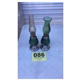 Two small green hobnail kerosene lamps