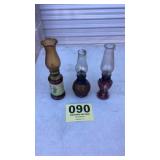 Three small kerosene lamps