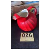 Red water pitcher.
