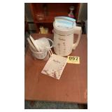 Nut milk maker with instruction and recipe book