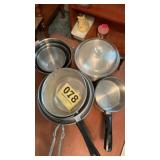 Mixing bowls and pots and strainers