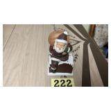 Heavy cast-iron Santa Claus sitting on the