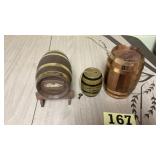 Three different keg style vintage coin banks two