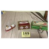 Two vintage tin banks from old Candy companies