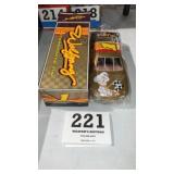 Walking in Candy motorsports Tin