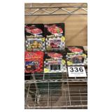 5 Racing Champions cars with cards