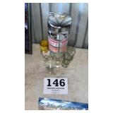 Alcoholic drink, shaker with shooters and shot