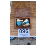 Wooden box with darts