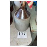 Brown top jug with flag
