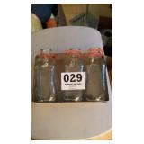Vintage half gallon milk jugs