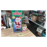Two vintage Santa Claus figurine decorations