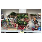 Table a lot of Christmas decorations
