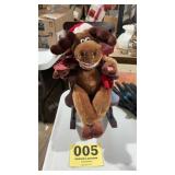 Musical Grandma moose in rocking chair, sings