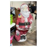 Vintage large blow mold Santa, has some damage