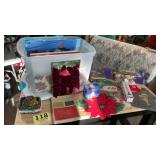 Tote with lid filled with Christmas decorations
