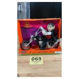 Musical, light up Dracula on motorcycle