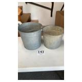 Two galvanized buckets