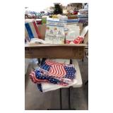 Box of plastic table clothes and skirting