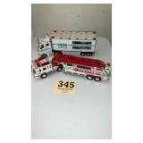 Hess truck lot with fire truck and race car