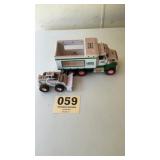 2008 dump truck and skid steer