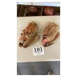 Two vintage baseball gloves