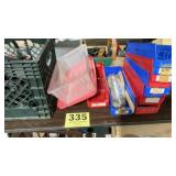 Plastic container of clamps and plastic