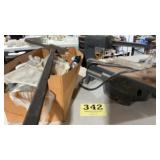Vintage tool, work gloves and scroll saw