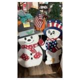 2 wooden yard snowmen