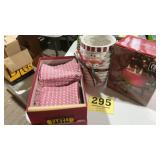 Christmas decorations and box of kitchen towels